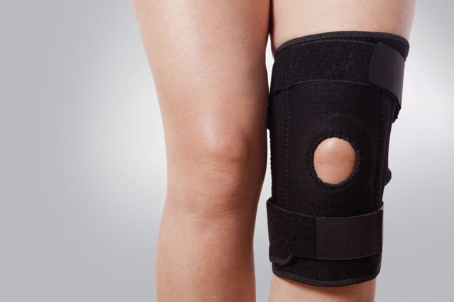 knee support brace on leg
