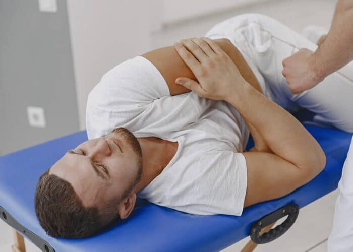 Chiro patient receiving chiropractic care for pain relief