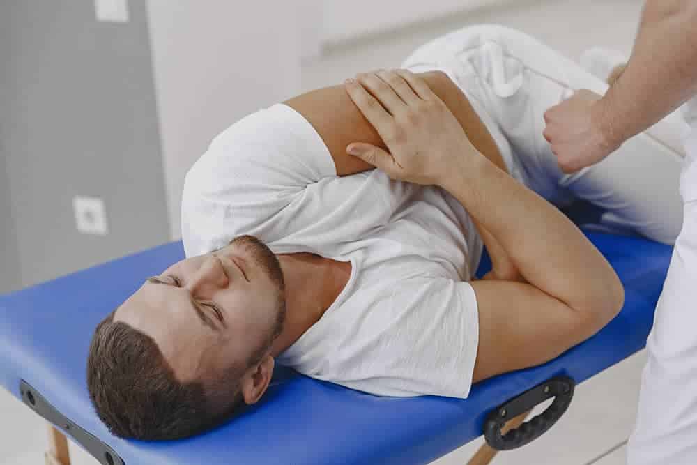 Chiro patient receiving chiropractic care for pain relief