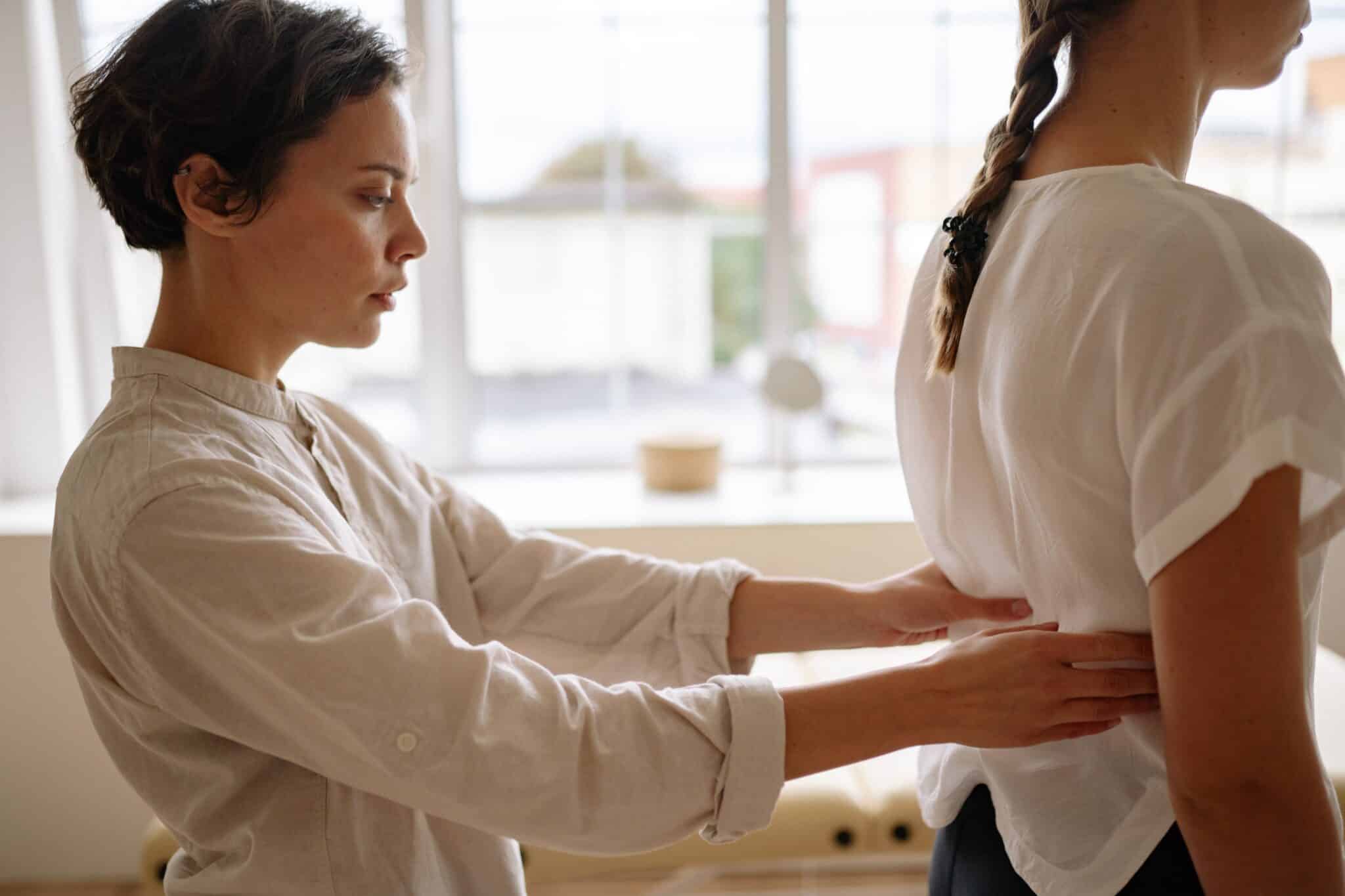 Chiro patient receiving spinal adjustment